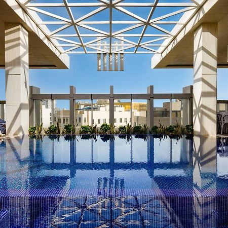 Millennium Place 도하 외부 사진 The rooftop pool at the Four Seasons Hotel, Cairo